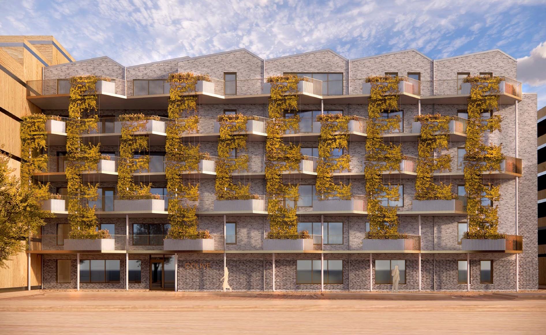 Ett modernt flervåningshus med en distinkt arkitektonisk design. Fasaden kännetecknas av ett upprepande mönster av utskjutande rektangulära balkonger, var och en prydd med vertikal grönska som hänger ned längs sidorna. Byggnadens yttre består huvudsakligen av ljusfärgade material, möjligen betong eller sten, vilket kontrasterar mot växternas organiska textur.